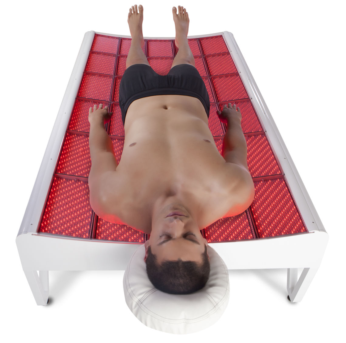 Image of a man in the lightstim bed